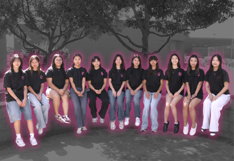 The fourteen members of Racer X² in matching black team shirts